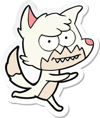 sticker of a cartoon grinning fox