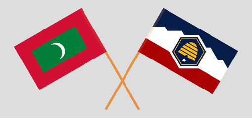 Crossed flags of Maldives and The State of Utah. Official colors. Correct proportion