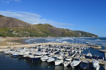 Fototapeta na wymiar Coastal view of boats at the harbour
