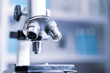 microscope with metal lens in lab , science equipment for research and development