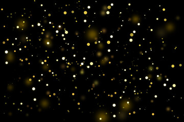 Fototapeta premium Abstract defocused lights and bokeh on dark background. Gold sparkles and glitter on black background