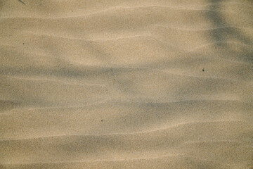 Sand dunes against the sunset light on the beach in thailand,Natural background