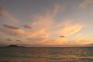 Beautiful Hawaii with its mountains, beaches, sunsets, and palm trees 
