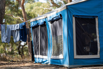 camper trailer set up in the  australian bush, campsite with clothes line