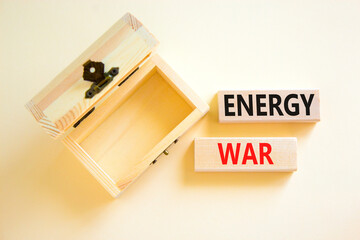 Energy war symbol. Concept words Energy war on beautiful wooden block. Beautiful white table white background. Empty wooden chest. Business and Energy war concept. Copy space.