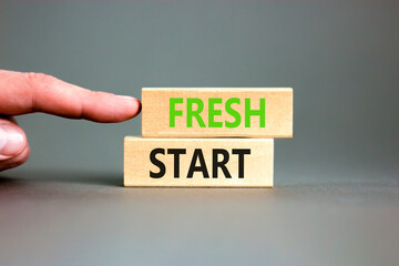 Fresh start and motivational symbol. Concept words Fresh start on beautiful wooden block. Beautiful...