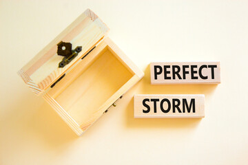 Perfect storm symbol. Concept words Perfect storm on beautiful wooden block. Beautiful white table...