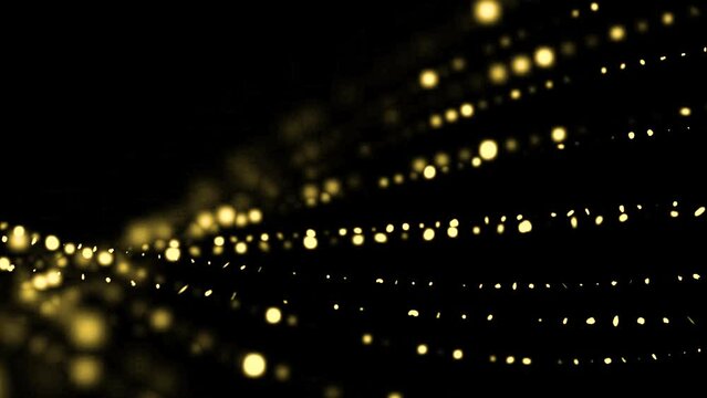 Golden glitter background in slow motion. real dust particles floating in the air. Universe gold dust with stars on black background.