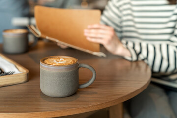 Cup of hot morning coffee in beautiful ceramic cup