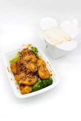 Chinese Takeout of Sesame Chicken and White Rice