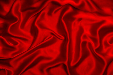 Red silk or satin luxury fabric texture can use as abstract background.