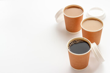 Coffee to go in many paper cups. Takeaway coffee