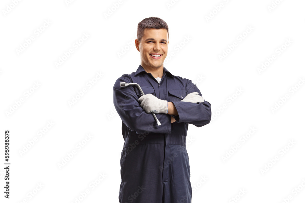 Wall mural mechanic holding a wrench and smiling - Wall murals