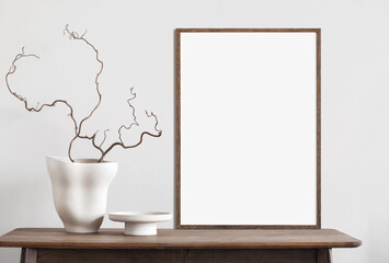 Blank wooden picture frame mockup on wall in modern interior. Vertical artwork template mock up for artwork, painting, photo or poster in interior design
