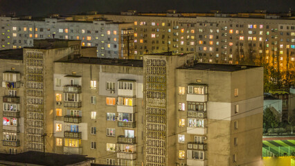 Fototapeta na wymiar City buildings at night from above