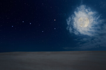 Naklejka na ściany i meble Sand beach or desert in a full moon night