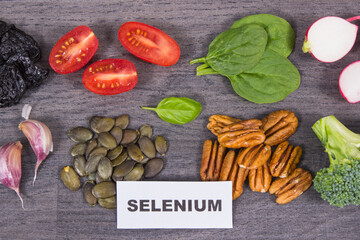 Healthy food containing natural selenium, fiber and other vitamins and minerals. Black wooden background