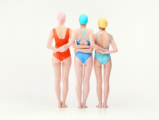 Three young women in vintage, colorful, retro swimming suits posing, holding hands isolated over white studio background. Back view. Concept of retro style, sport, fashion, youth, vintage