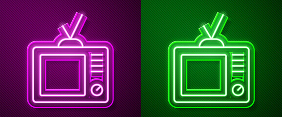 Glowing neon line Retro tv icon isolated on purple and green background. Television sign. Vector