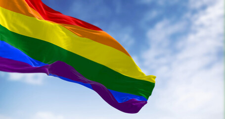 Rainbow flag waving on a clear day