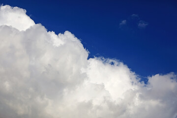 Naklejka na ściany i meble little clouds in the blue sky