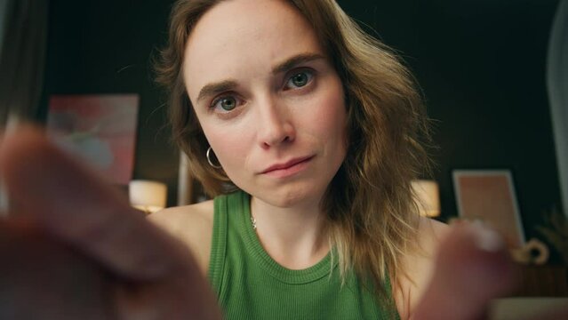 Pov serious woman scrolling invisible display. Girl hands swiping screen content