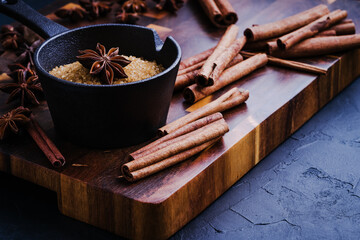 Christmas baking ingredients of gingerbread. Cinnamon, anise and brown sugar