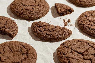 Creative composition made of brown american cookies closeup on pastel background. Minimal style. Bakery and pastry concept.