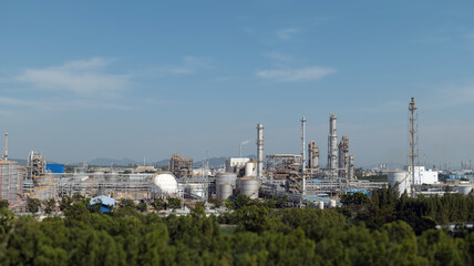 Chemical oil refinery plant, a crude oil refinery plant with steel pipes and chimney cooling...