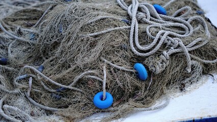 fishing net with buoys stacked