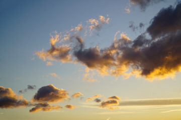 Dramatic sky with orange clouds at sunset