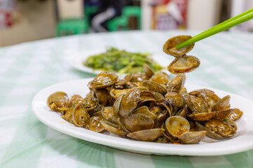 Chinese dishes stir fry clam with the sauce