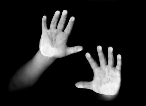 hands scanned on black background