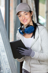 female construction worker using a digital tablet