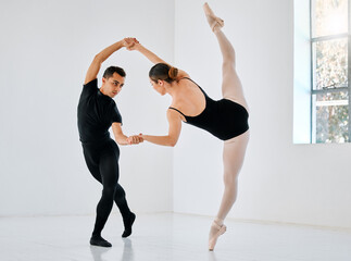 Obraz premium Preparation is a step by steo process. Full length shot of two young ballet students rehearsing in their dance studio.