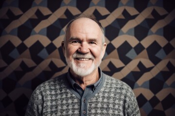Obraz premium Portrait of a smiling senior man with grey hair against vintage background