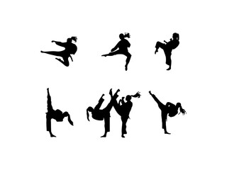  Karate girl silhouettes. Vector illustration. Karate martial art fighter sport silhouette. Female martial athlete silhouette. Vector set of karate fighting players in various poses. © VectorGrid