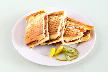 Turkish karisik atom Ayvalik tost ( kasarli bazlama tost) . Sucuklu, Kasarli, kavurmali karisik tost. Flat baked bread toasted