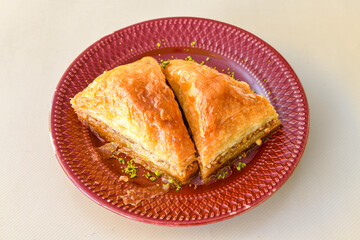 Turkish Dessert Sobiyet Baklava, mussels baklava and classic baklava with Pistachio . Didye, Cevizli, Fistikli Baklava, top view.