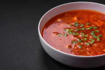 Delicious fresh Ukrainian borscht with beets, carrots and cabbage