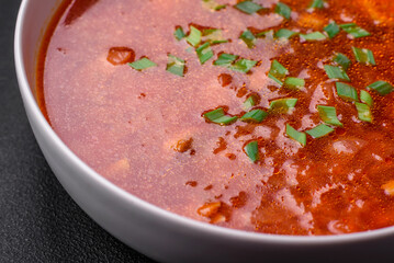 Delicious fresh Ukrainian borscht with beets, carrots and cabbage