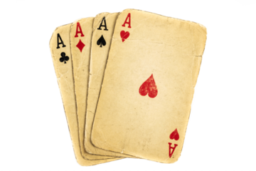 Four old dirty aces poker cards on a white background