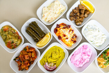Table scene of assorted take out or delivery foods. Traditional Turkish cuisine. Various Turkish meal and appetizers. Top down view on a table.