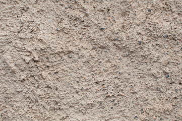 Rugged cement wall background with rough and detailed texture.
