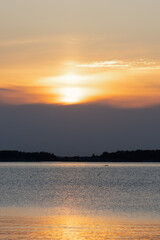 Beautiful landscape on the sea. Very beautiful sunset rays reflected in the water. Ripples on the water.