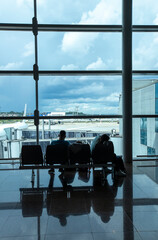 Silhouette of Passengers Waiting for Flight in Guarulhos International Airport. Sao Paulo, Brazil