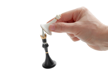 The hand holding the chess piece, the pawn beats the king, Checkmate, Business concept strategy, leadership, victory of white over black, cut out