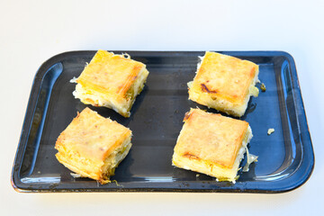 Turkish Dessert Sobiyet Baklava, mussels baklava and classic baklava with Pistachio . Didye, Cevizli, Fistikli Baklava, top view.