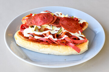 Turkish karisik atom Ayvalik tost ( kasarli bazlama tost) . Sucuklu, Kasarli, kavurmali karisik tost. Flat baked bread toasted