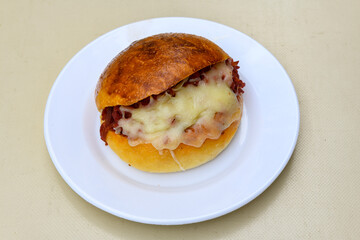 Big tasty burger with beef cutlet on a plate. Crispy chicken burger.